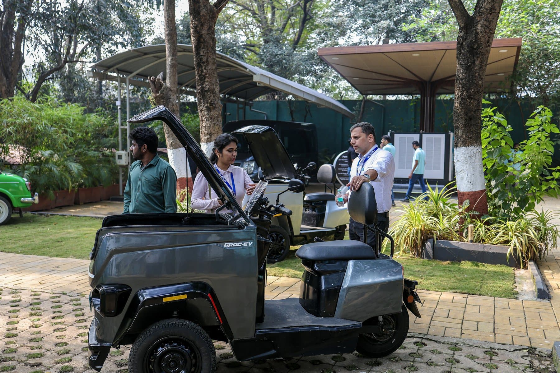 A graphite CROC EV at an exhibition with visitors