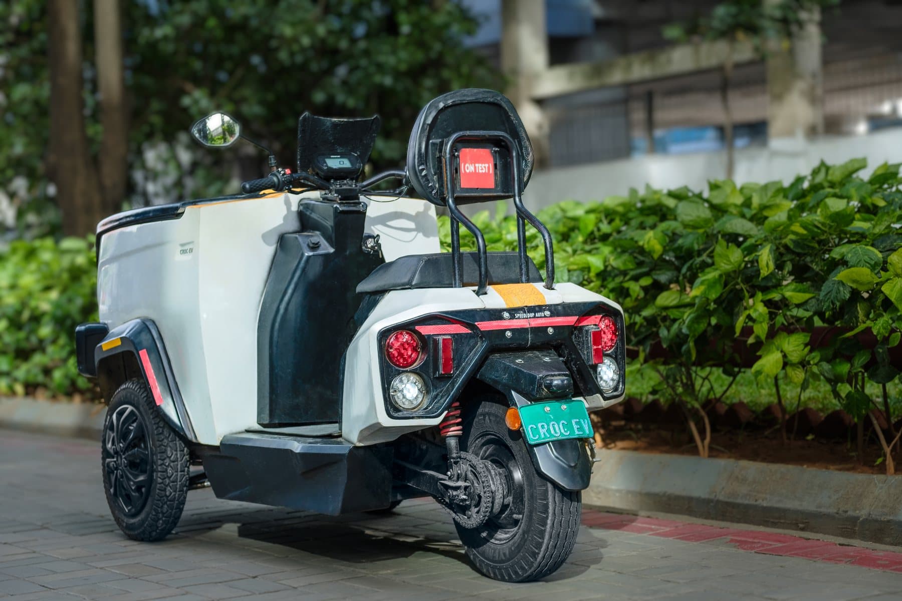 The rear of a white CROC EV